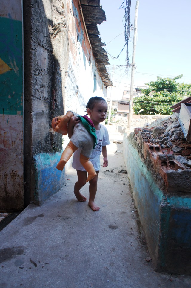 The house on the right collapsed. Will hers, on the left, be next?